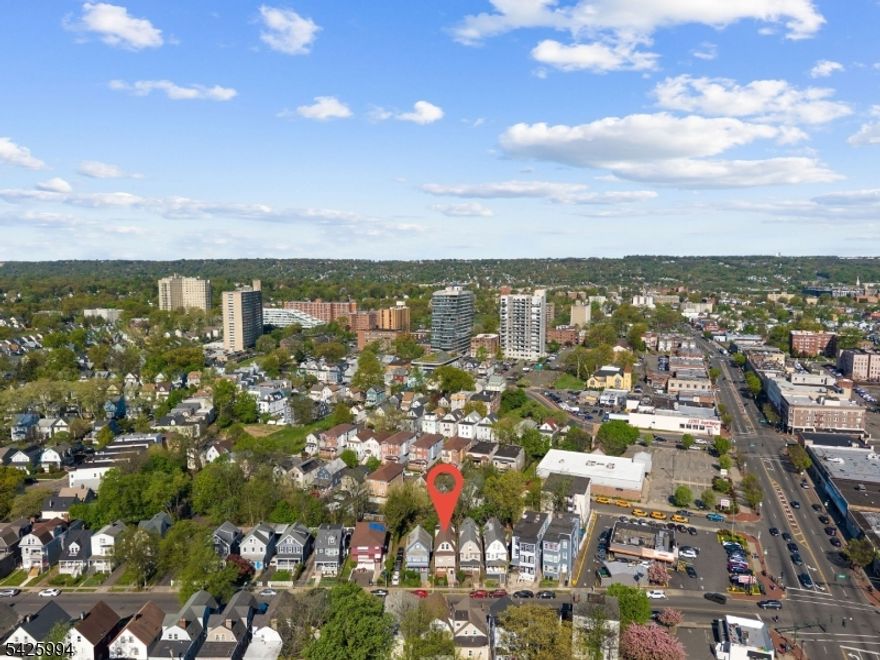 Beautifully renovated two-family home offering modern updates and functional living. Each unit features renovated kitchens and bathrooms with new appliances and updated finishes, along with new flooring throughout. The finished third floor provides additional living space, ideal for a variety of uses. The property also includes a spacious backyard suitable for outdoor enjoyment. Conveniently located near major transportation, shopping, and local amenities, this home presents a great opportunity for both owner-occupants and investors.