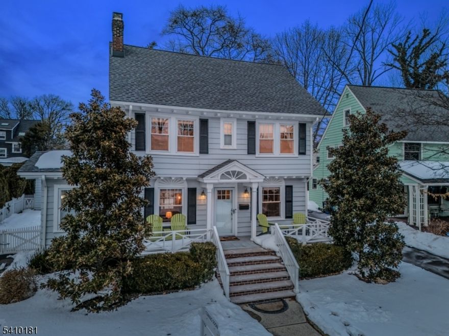 UPDATED & CHARMING MAPLEWOOD 4-BEDROOM, 2-BATH COLONIAL IN SOUGHT-AFTER NEIGHBORHOOD BLOCKS TO TOWN & TRAIN! Enviable curb appeal enhanced by decorative exterior woodwork, front porch overlooking sidewalked street, mature landscaping. Updated for modern living w/ Generac whole-home generator, inground Sprinklers, gas fireplace w/ remote, Mudroom w/ built-in cabinets & access to Deck/Drive, stunning 1st Level Full Bath, renovated Kitchen. Great layout for entertaining! Sunlit Living Room welcomes w/ marble-surround fireplace, built-in bookcase, picture box molding. Light-filled Eat-In Chef's Kitchen has it all expansive quartz countertops, bright white cabinets, stylish light fixtures, Center Island w/seating, s/s appliances. Sizable Breakfast Area is perfect for casual conversation or formal meals. Sliding glass doors open to covered Deck boasting original (1920s) wood flooring, decorative woodwork, ceiling fan, TV mount. Expansive Bluestone Patio & fully fenced, freshly sodded Back Yard are ideal for lazy afternoons or BBQs. Lovely, tucked-away Sunroom wrapped in Windows could be Office, Play Room, or morning coffee spot. 3 sunny, good-sized Bedrooms have large Closets & lots of Windows, share Full Hall Bath w/ marble penny tile & tub/shower lined w/ crisp Subway tile. Bedroom on 3rd level w/ large Walk-In Closet, skylight Window. Fully plumbed, w/ toilet, unfinished Lower Level offers amazing Storage & potential. Detached 1-Car Garage. 33-35 Madison is a true Maplewood gem!