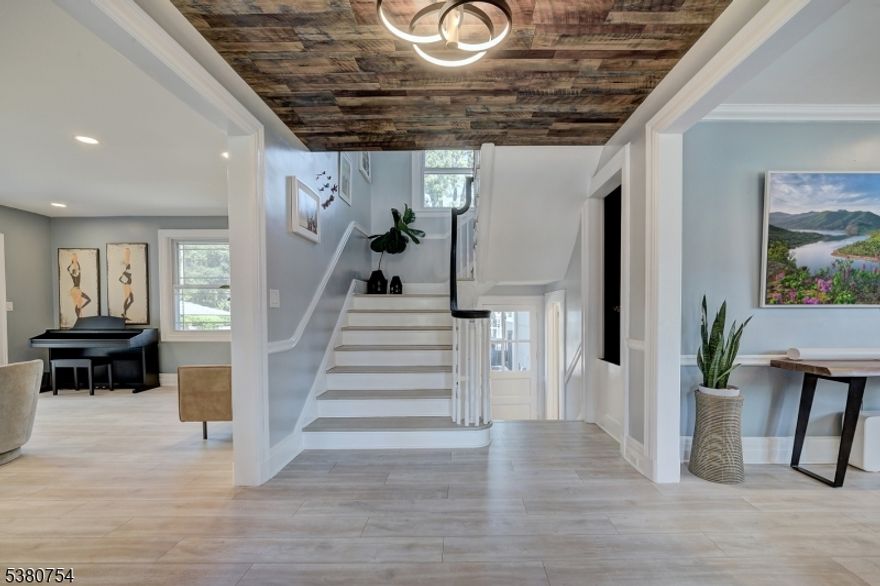 Welcome to 21 Melrose Place, Montclair - a beautifully renovated home that blends timeless character with modern living. Renovated & Move-In Ready: Updated finishes, abundant natural light, and a layout designed for both everyday comfort and entertaining. Spacious Bedrooms & Spa-Like Baths: Upstairs retreats that balance style with comfort. Flexible Living Spaces: Dedicated areas for work, play, or hosting. Backyard Sanctuary: Private, landscaped yard perfect for gatherings or quiet mornings. Commuter?s Dream Just 2 blocks to NJ Transit Bus 101 (daily service to NYC Port Authority)  Bay Street Station (less than a 5-minute drive) with direct trains to NYC Penn Station Prime Montclair Location - Vibrant downtown, restaurants, shops, top schools, and parks all nearby.