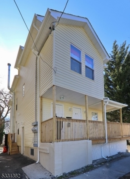 Investment Opportunity - Beautiful 2-Family HomeTotally Renovated in 2020. This stunning 2-family property offers a seamless blend of modern upgrades and timeless charm, making it ideal for both investors and homeowners.Prime Location (9 minutes walking from Plainfield train station):Just 1 hour from Manhattan-34th Street Penn Station, offering an effortless commute.Conveniently located near Plainfield Train Station, shopping, restaurants, and downtown Plainfield's vibrant lifestyle.Property Highlights:Unit 1: 2 bedrooms, 1 bathroom.Unit 2: 4 bedrooms, 1 bathroom.Additional rooms and full bath in the lower level.Enormous yard with space on the side and back of the lot.Oversized Lot (7,826.51 sqft).Separate utilities tenants pay for heat and hot water.Zoned R4, not in a flood area.Parking and Utilities:Driveway with a 3-car capacity and blacktop surface.Public water and gas, window AC.Income Potential:This property offers a possible yearly income of $72,000, making it a lucrative investment opportunity.This is a rare opportunity to own a beautifully renovated property in excellent condition. Whether you're looking for a home with rental income potential or a smart investment, this property checks all the boxes. Act fast this won't last long.