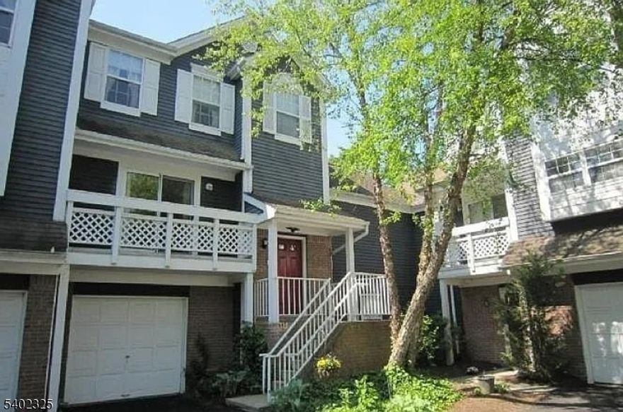 Walkable to Princeton Junction Train Station (0.6 miles), this spacious 2,240 sq ft multi-level townhouse rental in Princeton offers a flexible four-bedroom layout with thoughtfully separated living spaces ideal for commuters or work-from-home needs. The main level features a hardwood-floored living room, updated kitchen with stainless steel appliances, dining area with access to a private balcony, plus a bedroom and full bathroom for added versatility. The second level includes a primary bedroom, an additional bedroom, and a full bath, while the walk-out lower level offers a family room with a wood-burning stove, a fourth bedroom, a full bathroom, and direct access to a private patio. Additional highlights include in-unit laundry, central air and heat, a one-car garage with additional street parking, and access to a community tennis court. Enjoy a quiet residential setting with limited through-traffic while being steps from Northeast Corridor rail service to New York City and Philadelphia, and minutes to Nassau Street dining and shopping, MarketFair, Quaker Bridge Mall, Route 1, I-95, I-295, the New Jersey Turnpike, Princeton University, nearby parks and canal paths, and major medical centers.