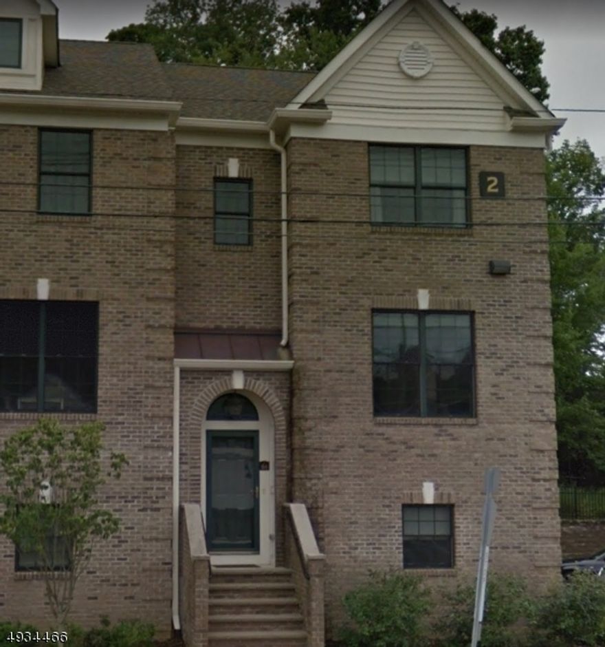 Experience the ultimate in Manhattan-style living in this stunning end unit townhouse, complete with a convenient bus stop to New York right at your doorstep. This exceptional home defines luxury living, featuring outstanding upgrades throughout. Enjoy spacious and sun-filled living in this 2-bedroom, 2.5-bathroom unit, complete with a ground level den/possible 3rd bedroom. The large eat-in kitchen boasts granite countertops, an island, and stainless steel appliances, while the formal living room with gas fireplace and custom cabinetry provides the perfect space for relaxation and entertaining. The first floor also includes a dining area, powder room, high ceilings, and hardwood floors for a warm and inviting ambiance. Upstairs, the master bedroom offers two walk-in closets and a master bath with double sinks, soaking tub, and stall shower, while the second bedroom features a double closet. The ground level den/office, laundry room, and 2-zone heating and air conditioning provide added convenience to this exceptional home.