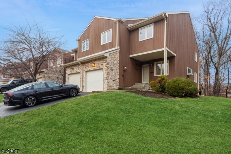 Location, Location, Location! This 3-story end-unit townhome is perfect for commuters, offering easy access to major routes. The open floor plan welcomes you with a spacious living area featuring a cozy gas fireplace and soaring cathedral ceilings. The living space seamlessly flows into the dining area, where sliders lead to a private deck?ideal for relaxation or entertaining. Head upstairs to discover three generously sized bedrooms. The primary suite boasts a beautifully updated bathroom with a luxurious oversized shower and a huge walk-in closet. Two additional large bedrooms and a full bathroom complete this level.The lower level offers ample storage space and a versatile family room, perfect for a home office, gym, or playroom. Pack your bags and move in!