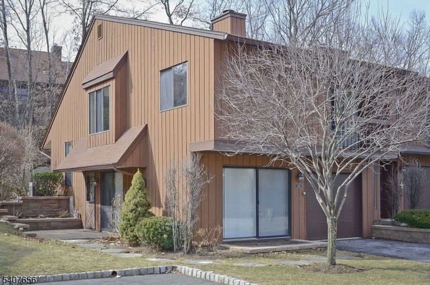 This desirable end-unit townhome offers exceptional privacy and abundant natural light in the highly sought-after Overlook Village of Wharton, New Jersey. Featuring a contemporary multi-level design, the home boasts a dramatic living room with cathedral ceilings, a wood-burning fireplace, and a sliding glass door that opens to a private deck and yard that is perfect for relaxing or entertaining. The updated kitchen is equipped with stainless steel appliances and flows seamlessly into the home?s open and flexible floor plan, ideal for today?s lifestyle. Additional highlights include an attached garage and thoughtfully designed living spaces with unique architectural details throughout. Conveniently located just moments from public transportation and major highways, this townhome provides effortless access to surrounding areas while maintaining a peaceful residential setting. Don?t miss the opportunity to call this exceptional property home?schedule your private showing today and experience the comfort and lifestyle that Overlook Village has to offer.