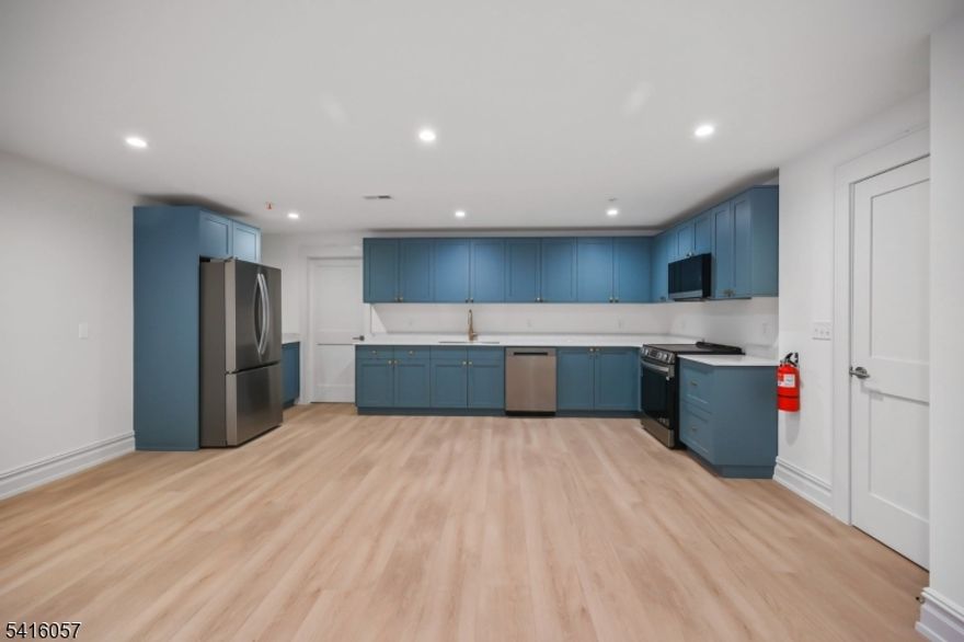 Welcome to 1209 Littleton Road! Truly high-end! A brand-new, modern, and spacious residence in a beautifully designed multifamily building. This 2-bedroom, 2 and 1/5 bath apartment combines contemporary style, comfort, and convenience in a quiet setting while keeping you close to everything you need. This bright and thoughtfully designed unit features beautiful wood floors, soundproof construction, and large windows that fill the space with natural light. The primary suite is your spot! with walk-in closet and primary bath. The modern kitchen is equipped with premium LG appliances, linen closet, pantry and excellent storage. The home is also smartphone integrated. Additional features include washer and dryer in unit, private entrance and two parking spaces. Excellent location: Located across the street from the high school and just around the corner from the elementary school, this property is also close to restaurants, parks, houses of worship, gyms, and everyday conveniences. Easy NYC commute; convenient access to train and bus routes to New York City, making commuting simple.1209 Littleton Road is the perfect balance; close enough to major roads for convenience, yet set back enough to enjoy the quiet and comfort this apartment offers. Renter's insurance required. Credit check, income & employment verification required. A background report is required for all applicants 18 years and older.