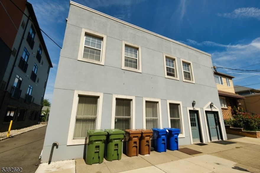 7200 sq ft mixed use building for sale. Located in the heart of downtown Linden. 5200 sq ft warehouse / office on the 1st floor. With high ceilings, two bay doors, and ample storage. 2nd floor features two apartments. 2bd & 1bd units that are rented mo / mo.