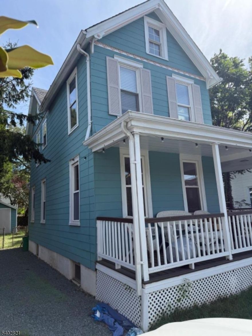 Wonderful investor opportunity in desirable Nutley, located on a quiet no-through street and close to town shopping and top-rated schools. This home offers a private and serene setting with classic charm throughout. Timeless details begin with the open front porch and welcoming entry foyer. Nine-foot ceilings on the first floor and a gracious layout create a warm, inviting atmosphere. The home features a living room, offering flexible space for everyday living. A large formal dining room with a kitchen that provides access to a fenced backyard with patio, ideal for outdoor enjoyment. And an other room for more living space. The second floor offers three bedrooms, including a primary bedroom with cathedral ceiling and skylight, bringing in abundant natural light. A lovely home for those seeking comfort, privacy, and convenience near all that Nutley has to offer. Home is being sold AS-IS where is, owner has not lived on property and makes no representations, no credits, no repairs. Delivered vacant, buyer responsible for municipal certs.