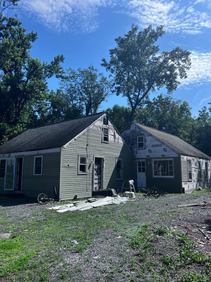 Amazing REHAB opportunity. DUPLEX. AS-IS. Builders, Contractors & Investors.Direct access to Copper Creek leading into the Delaware River.