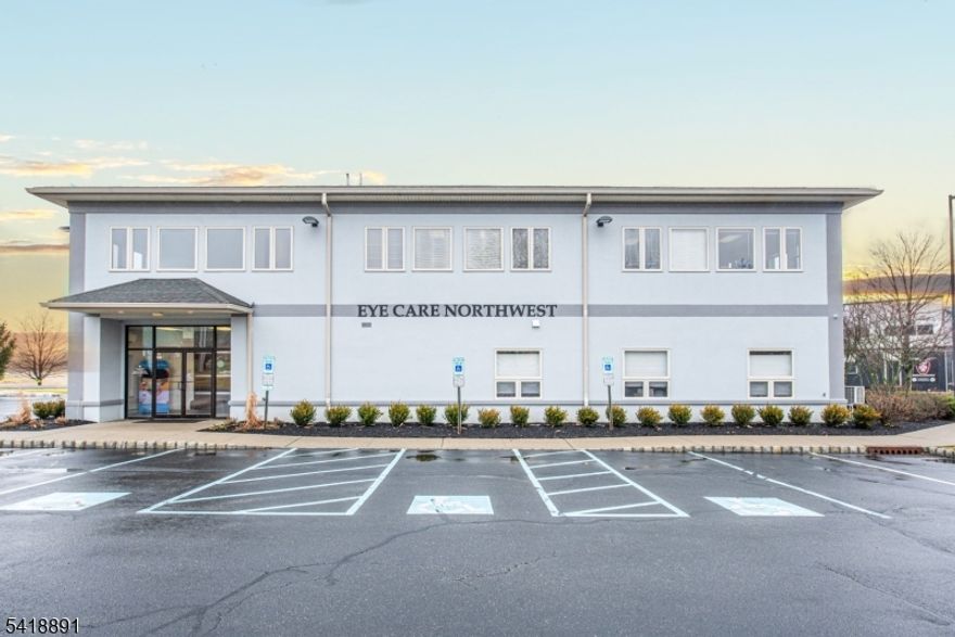 Fully leased, income-producing professional and medical office building located within a well-established business district just off Route 15 in Sparta. The property offers approximately 11,000 SF of well-maintained office space and is fully occupied, providing consistent cash flow supported by a stable mix of medical and professional tenants. Lease structures include a combination of NNN and gross leases, allowing for expense reimbursements while maintaining predictable income. Planned capital improvements include HVAC upgrades and conversion to natural gas, which are expected to enhance efficiency and reduce operating costs. Additional features include elevator service and ample on-site parking. Located within a well-established professional business district with convenient access to Route 15, the property supports long-term tenancy without reliance on retail visibility.
