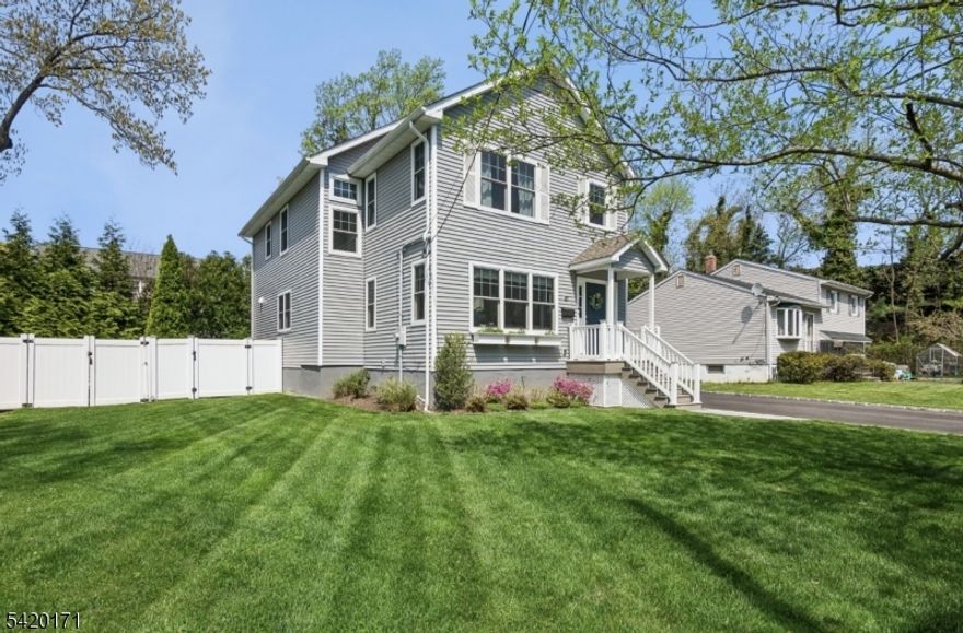 This Summit beauty has 5 bedrooms, 3.5 baths and high-end finishes throughout. Bright and sunny with an open floor plan that includes gleaming hardwood floors, an all-white eat-in kitchen with access to the back yard, a center island, quartz counters, hex tile back splash along with stainless appliances. There is a first floor bedroom and four additional bedrooms on the 2nd floor, including the primary bedroom with a glamorous en-suite bath and walk in closet. The other three bedrooms are a good size with loads of closet space. The finished basement offers a dedicated recreation room, workout room and laundry room. The home was completely renovated in 2021 and is move-in ready. The home offers the ideal blend of modern design, and thoughtful layout that perfectly suits today's lifestyle. Step outside and enjoy a private yard with a  paver patio, ideal for relaxing or entertaining . The home is located just minutes from downtown Summit, top-rated schools, shopping, dining, and the Midtown Direct train to NYC. The location also offers easy access to Route 24, making a commute a little easier. This is a rare opportunity to own a fully updated, turnkey home in beautiful Summit New Jersey.