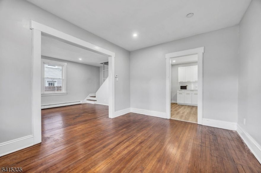 Welcome to this charming single-family Cape Cod located at 425 Mercer Ave. This well-maintained home showcases beautiful original wood floors throughout and offers a warm, inviting layout. The main level features a spacious living room, formal dining room, kitchen, full bathroom, and three generously sized bedrooms. A walk-up attic with windows provides excellent potential for additional living space, home office, or storage. The home also includes a finished basement, offering additional utility and storage space. Situated on a huge lot, this property offers incredible outdoor space   perfect for entertaining, expansion possibilities, gardening, or simply enjoying your own private retreat. The large backyard is a rare find and a true standout feature. Additional highlights include low property taxes, a one-car garage, and a private driveway with parking for 3-4 cars. Conveniently located near shopping, schools, parks, and transportation. Don't miss this opportunity grab it while it lasts!