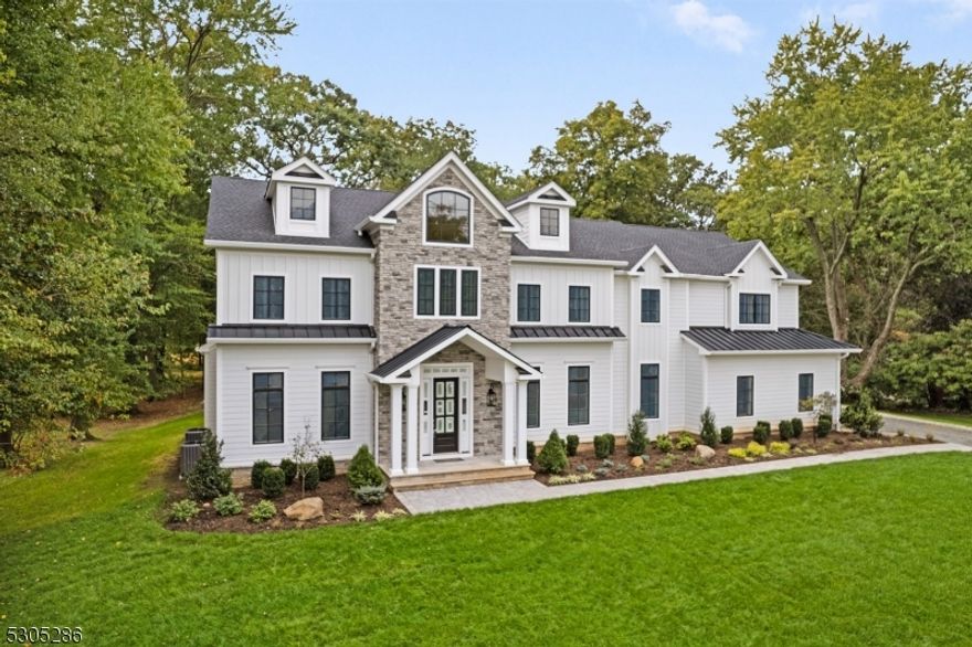 Newly constructed and truly "One of a Kind," this custom home on an oversized lot in Florham Park backs up to serene green acres. With six en-suite bedrooms, this home offers luxurious comfort for every resident. The primary suite is a standout, featuring two full baths with connecting walk-in closets, providing personal space for each partner. As you step inside, you're welcomed by a grand two-story foyer, with 10' ceilings throughout the first floor enhancing the sense of spaciousness. The heart of the home is the custom kitchen, complete with a walk-in pantry and butler's pantry, flowing seamlessly into a large gathering room. Other highlights include a formal dining room, a cozy library, an in-law suite, and a practical mudroom with cubbies for added convenience. Step outside to a 24' x 14' covered loggia, equipped with an outdoor kitchen and a designated area for TV viewing perfect for entertaining. The second floor features 9' ceilings, a full laundry room, and a versatile open space ideal for a computer or craft room. The home also includes two powder rooms one on the first floor and another in the finished third floor. Premium hardwood floors grace the entire home, complemented by custom tile work in all bathrooms. The three-car garage is thoughtfully designed with an exterior door and a utility sink for easy cleanups. Additionally, the 2,200 square-foot basement with 9' ceilings offers the option to be finished, providing even more living space.