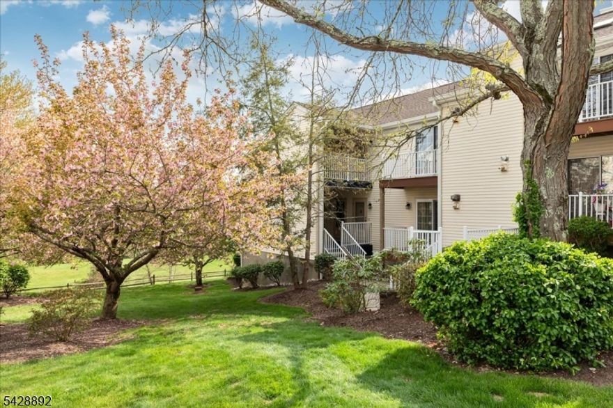 Welcome to the highly desirable Spring Ridge community in Basking Ridge, known for its top-rated school district. This beautifully updated Ardsley model offers ground-level living with a spacious walk-out patio in Madison Village. This stylish home features an open-floor plan filled with natural light, connecting the living and dining areas. The remodeled kitchen showcases modern finishes, quartz countertops, tile flooring, a peninsula breakfast bar, and ample pantry storage, perfect for everyday living and entertaining. The updated bathroom provides a spa-like retreat with quartz counters and elegant tilework. The spacious bedroom includes a large closet and direct access to the bath for added convenience. Enjoy an in-unit washer and dryer, assigned parking, and ample guest parking. Step outside to your private patio and take in serene views of lush greenery. Residents benefit from an on-site community manager, playground, tennis courts, clubhouse, bicycle/walking paths, an inground pool, and bocce courts. This 326-acre, beautifully maintained community is adjacent to over 100 acres of preserved natural land, offering a peaceful, wooded setting. A commuter?s dream, close to shopping, medical facilities, restaurants, major highways, and to NYC transportation. Explore nearby recreation such as the Somerset Hills YMCA & the JCC in Bridgewater, along with Somerset County parks including Lord Stirling Park, Colonial Park, Washington Valley Park, & the Sourland Mountain Preserve.