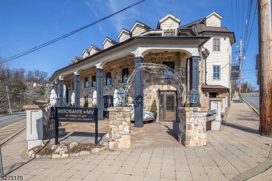 A Historic Olcott Square Landmark, 1 MILL  STREET, remodeled & revitalized, has stood the test of time. Originally built in 1849 as The Old Stone Hotel,  this iconic stone treasure has hosted generations of patrons, providing lodging, food, libations, and entertainment. At least a dozen operators have occupied the stone and wood three story building in downtown Bernardsville since its inception 175 years ago with major multi-million dollar exterior and interior improvements in 2007 that included the repointing of the stone walls and a top to bottom interior redo. Subsequent remodeling was conducted in 2016 and 2021. The current lessee operates a multi-floored upscale restaurant offering formal and casual dining. With almost 10,000 square feet of space with outdoor dining area, this turnkey property includes generous private parking and is near public parking spaces and the Quimby Lane Redevelopment Plan District!