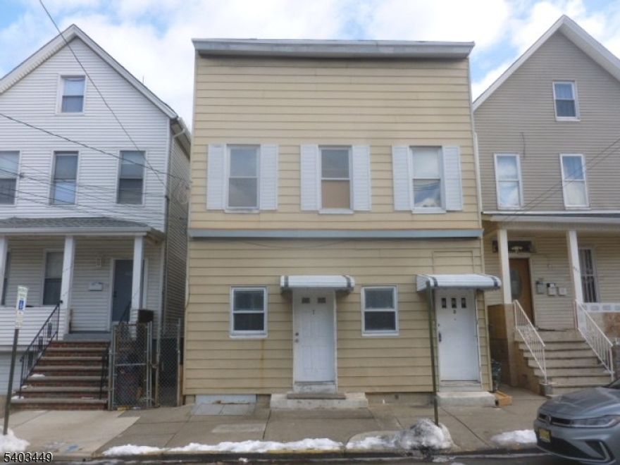 Spacious, 2nd floor apartment, recently updated eat-in-kitchen and bathroom. Kitchen has a variety of cabinet sizes and updated appliances, including new microwave oven, 3 bedrooms, plus spare room/den which can be used as a 4th bedroom. Hardwood flooring throughout, decorative ceramic tiled bathroom. Decorative tiled shower stall with modern rain shower head. Close proximately to major roadways, Liberty International Airport, Jersey Gardens Shopping Mall and NYC markets. Smoke-Free Environment.