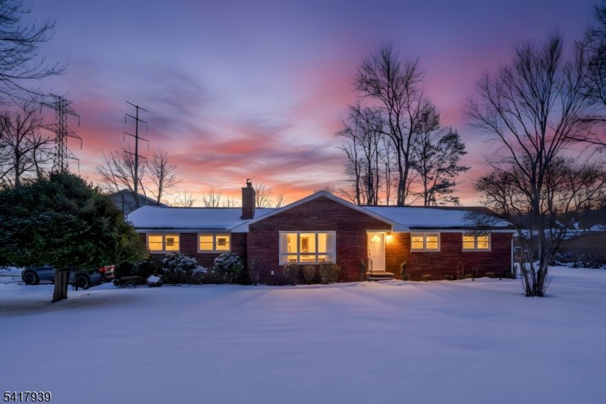 Welcome home to this beautifully updated ranch on a prime corner property in the highly desirable town of East Hanover, right in the heart of Morris County. This home features new hardwood floors and recessed lighting throughout, along with a spacious open layout offering 3 spacious bedrooms and 2 full spa-like bathrooms. The main level includes a bright living room, dining room, kitchen, sunroom, and a cozy den with a 2-way fireplace perfect for everyday living and entertaining. A full finished basement spans the entire home and offers a large family room plus two bonus rooms for added flexibility. Complete with a 1-car garage and a driveway that fits 4+ cars, this move-in ready home combines space, comfort, and convenience in a sought-after location.