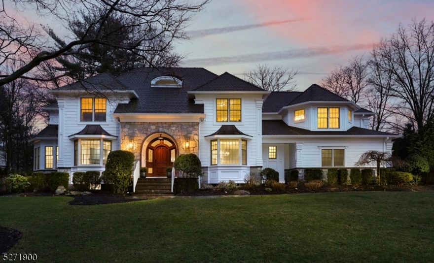 Stunning home in the heart of highly sought-after Wychwood.  Offering high ceilings, custom millwork and moldings, gorgeous hardwood floors and numerous custom upgrades throughout, this home is a show stopper. First floor includes a 2-story foyer flanked by the formal dining room with tray ceiling  and bay window and the formal living room boasting a gas fireplace shared with the cozy sunroom. The renovated kitchen featuring a center island breakfast bar, professional grade SS appliances, farmhouse sink opens to the spacious breakfast room and further into the great room with coffered ceiling and gas fireplace. A first floor en-suite bedroom with private bath, mudroom and laundry room complete the first floor.  The second floor is home to the primary bedroom highlighted by a sitting room with rotunda ceiling and  gas fireplace, WIC and a gorgeous private bath.  Two Jack-n-Jill bedrooms share a bath while two addl bedrooms share a full hall bath. The impressive, recently finished lower level boasts an expansive rec room with wet kitchen, gym, gaming area, media space and full bath. Set on .40 professionally landscaped acres including a raised paver patio and 3-car attached garage, this homeis sure to impress!