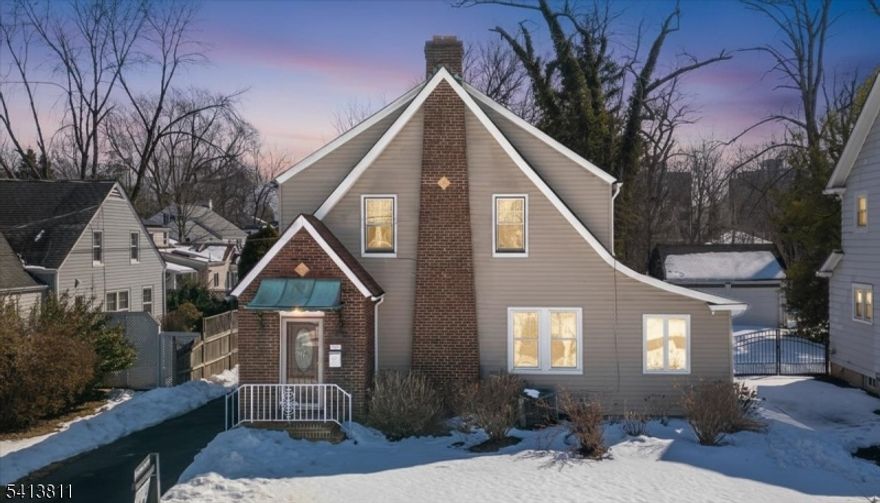 Four-bedroom, 2.5-bath Colonial located on a tree-lined street. The home features a finished basement with separate access, offering flexible use options. Recent updates include a renovated full bathroom, hardwood floors, newer windows, siding, electrical upgrades, and hot water heater.Additional features include a full walk-up attic with finishing potential, a two-car detached garage with storage space, and a screened-in porch. The backyard includes a paver patio with pergola and landscaped garden area.Buyer to verify room dimensions and permitted uses.