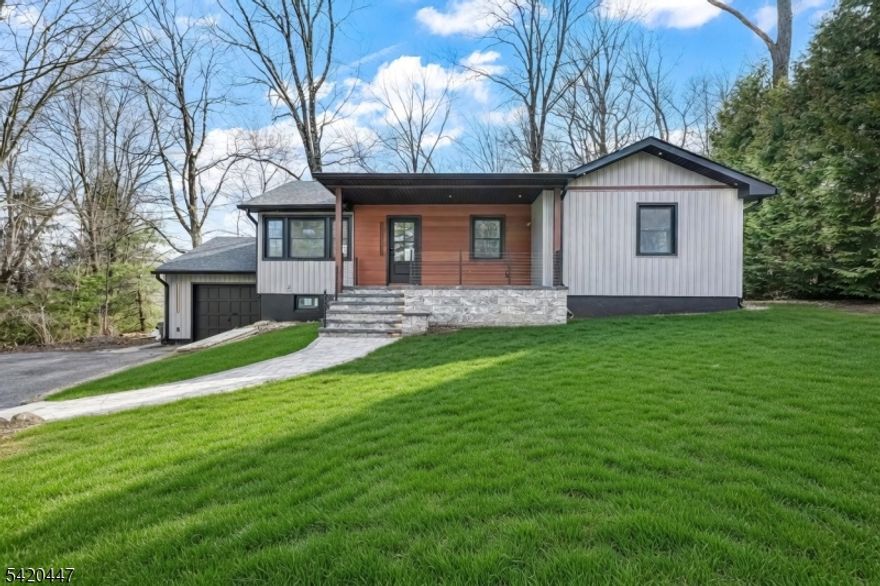 Completely renovated from top to bottom, this move in ready home is located in West Milford, just 2 blocks from High Crest Lake,.The house was redone inside and out. Updates include new hardwood floors, walls, windows, siding, gutters, roof, kitchen, bathrooms and more. Before Closing the home will  have brand new central air. The heating system is oil (above ground) located in the garage.The main floor has 3 bedrooms and 1 full bathroom, which includes both a shower and a tub. The primary bedroom has 2 closets. The kitchen and living room are open concept and include an electric fireplace, along with completely new appliances, and towel warmers. The finished basement adds extra space and includes 2 additional rooms, 1 full bathroom, a laundry area with hookups, a mechanical room, and a separate entrance from the back, transform the basement into endless possibilities. It also has direct access to the garage. The septic system was serviced in December 2025. Long driveway offering plenty of parking. A great opportunity to own a fully renovated home in a quiet area near the lake. Wood burning fireplace in the basement. Septic recently serviced in December 2025, not knowing issues, as-is. New owners have the option to become members of the lake community and have access to all the lake activities if desired.