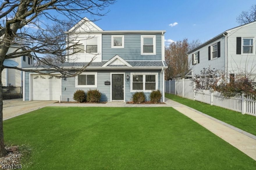 Welcome to this impeccably renovated 3 bed, 2 full bath, first floor residence - part of a thoughtfully reimagined two-unit home featuring high-end upgrades throughout. No detail was overlooked in creating a modern, turnkey living experience. This property has been fully updated with all new siding, flooring, a new roof, new sewer line, insulation, new windows, fresh walls and paint, and a substantial, double layer sound barrier between the units for enhanced privacy and comfort. The home features 2 beautifully designed, completely renovated bathrooms (one with tub) and a gorgeous kitchen showcasing quartz countertops, new cabinetry, and stainless steel appliances. Enjoy a sun filled open-concept living, dining, and kitchen area, along with 3 well appointed bedrooms, one with en suite bath. Additional highlights include all new lighting, hardware, a Nest thermostat, private laundry with prep area, custom closets, a dedicated patio & level fenced in yard, one car attached garage with storage space, and two additional driveway parking spaces. A truly move-in-ready unit offering the perfect blend of modern luxury, thoughtful design, and everyday comfort. Conveniently located on a quiet street close to Briant Park, NYC transportation, and Summit's vibrant downtown!