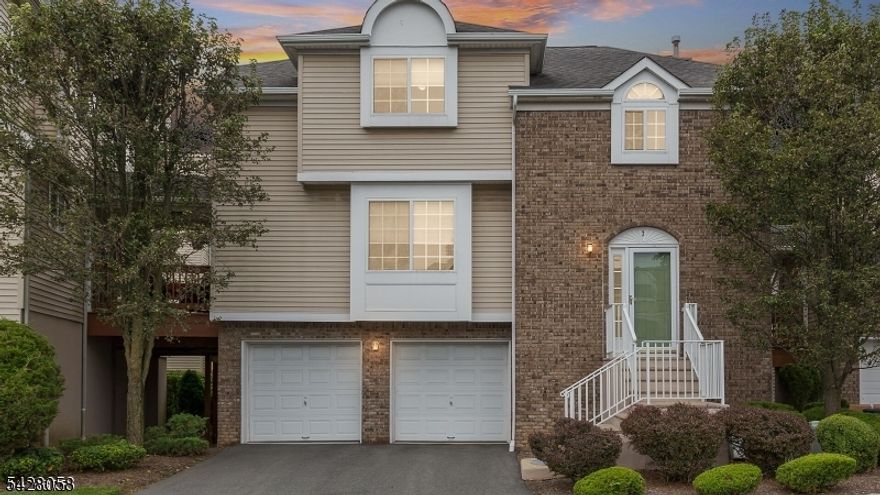This stunning, move-in ready 3 bedroom, 2 1/2 bath end-unit townhouse, is perfectly situated on a quiet cul-de-sac in highly rated Berkeley Heights. Offering maximum privacy with no common walls, this residence is conveniently located close to downtown, top-rated schools, shopping, and major transportation, including bus and train lines. The first floor is designed for modern living with open, bright spaces, recessed lighting and Hardwood Floors throughout. The Living Room, accented by a gas fireplace and featuring glass sliders that open to two private Decks, is positioned adjacent to the formal Dining Room. The light-filled Kitchen features crisp white cabinetry, a stainless steel farm sink, and a skylight, with a breakfast bar and custom built-in pantry with coffee station flowing seamlessly into the Family Room. The second floor includes a spacious Primary Suite, luxurious spa-like primary Bath and custom walk-in cedar closet and additional cedar closet. This level also includes two additional nice-sized bedrooms, a renovated second full bath (2022) with Carrara marble, and a convenient Laundry area. The walk-out lower level features an exercise room, storage, and sliders to a patio with a gas grill, with an opportunity to create additional finished living space. Improvements: Interior painted, new LG refrigerator, gas-line for outdoor grill, laminate wide plank flooring in Primary Suite and guest Bedroom, new vent-free logs/burner kit for FP and Hot Water Heater 2026.