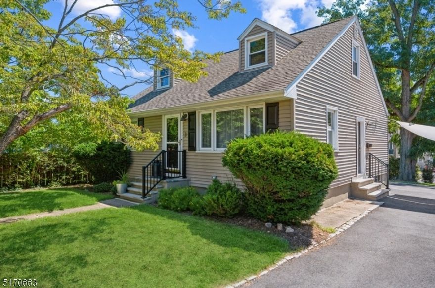 Modern, manicured & move-in ready! You will fall in love with this COMPLETELY RENOVATED Cape Cod boasting an array of sleek finishes & a thoughtful, open plan layout. Situated on a manicured lot with a deck and a fabulous backyard patio, this home encompasses 4BD, 2 1/2BTH & a 6 cars exclusive driveway. It is conveniently located near schools, walking distance from rest, stores, direct train station to NYC & all the amenities this desirable community has to offer. Standouts include hardwood floors, a cool, calming color palette, a large eat-in kitchen, a finished basement & a backyard oasis ideal for entertaining. The living space flows from the light-filled LR to the sleek & stylish eat-in kitchen w/crisp, white wooden shaker style cabinetry, quartz counters, subway tile backsplash & SS appliances. The beautifully inlaid hardwood floor anchors a generous open dining area in this light & bright space. Glass sliders open to the new TREX deck w/waterproof storage underneath & stone paver patio with built-in storage benches, overlooking the fenced-in backyard offering plenty of space for gardening, playing &relaxing. This 1st floor includes 2 good-sized BDs & a full BTH. Upstairs, a spacious primary bedroom suite complete with dormer windows, a WIC & a full en suite bathroom w/an oversized shower. Even more living space has been created in the finished basement including a large family room with a bar, a 4th bedroom, a half bathroom, laundry room & ample storage.