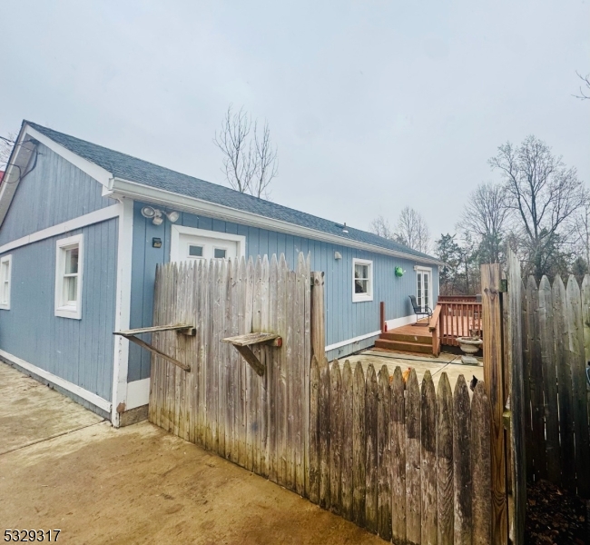 Welcome to this charming 2-bedroom ranch home located in the beautiful Readington Township, Hunterdon County.  The home is part of the highly sought-after Blue-Ribbon School District. This well-maintained home offers a spacious living room that seamlessly flows into the kitchen, providing a bright and inviting atmosphere. Featuring a full bathroom and ample functional space, this home ensures both comfort and privacy. With its close proximity to shops and local amenities, it offers great convenience. The property also boasts incredible potential, making it the perfect canvas to transform into your dream home. Don't miss the opportunity to make this yours!