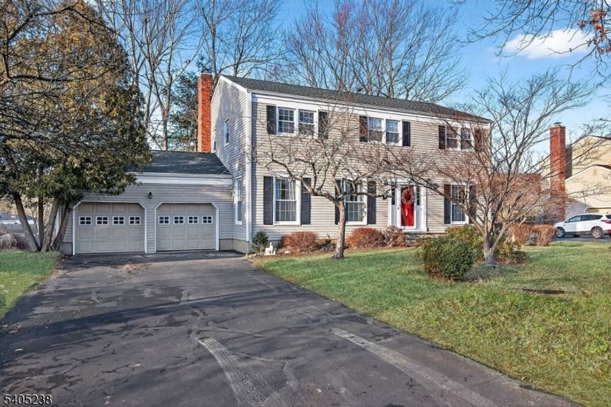 **ALL OFFERS DUE BY THURS. 1/22 AT 5PM** Welcome to this classic Colonial set on a picturesque half acre in desirable Mendham Boro, renowned for its award winning schools. This 4 bedroom, 2.1 bath home offers timeless charm paired with thoughtful updates and generous living space. Hardwood floors flow throughout the first and second levels-under carpet as well.  The inviting family room features a wood burning fireplace with new liner 2021 for cozy evenings and entertaining. The updated eat in kitchen is designed for both function and style, offering stainless steel appliances, granite countertops, under cabinet lighting, garbage disposal, and glass sliding doors offer direct access to a large deck ideal for outdoor dining or relaxing while overlooking the backyard with plenty of room for future pool. Upstairs, four spacious bedrooms provide comfort and flexibility, including a primary suite with walk in closet and private en suite bath. Additional highlights include a natural gas whole house generator, newer roof, furnace, public water & sewer for peace of mind. full unfinished basemt with endless potential, a two car garage, ample storage, sought after location close to parks, local amenities, and major commuter routes, all while enjoying the exceptional Mendham lifestyle. This well-maintained home has been lovingly cared for by same owner for over 50yrs & will be an as-is sale with no known issues. Roof 2017, Furnace & Chimney Liner 2021, Nat. Gas Generator 2018, CAC 2009