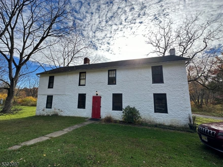 Own a piece of history!  Wide-plank floors, 18-20 inch walls, historical built-ins, and an incredible original stone fireplace make this home one-of-a-kind. The colonial-style home has a functional layout and 1+ acre of property.  Enjoy this 1700s home; filled with potential and opportunities to customize to your own liking.