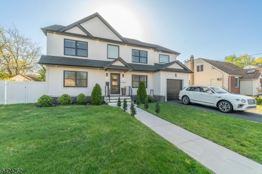 Welcome to this stunning 1-family custom Colonial featuring an open-concept layout, offering 5 spacious bedrooms and 3 full bathrooms. The first floor boasts a generous living room, formal dining room, and a large eat-in kitchen that flows seamlessly for both everyday living and entertaining, along with a convenient first-floor bedroom and full bath. The second floor includes a primary suite with a private en-suite bathroom, plus three additional bedrooms, a full bath, and a laundry room. The finished basement provides additional living space with a recreation area and office space; ideal for work or relaxation. Enjoy a private, enclosed backyard with plenty of room for outdoor activities, along with the convenience of an attached 1-car garage. Located near top-rated schools, this home offers both comfort and a highly desirable location. A perfect blend of space, style, and functionality ready to welcome you home!