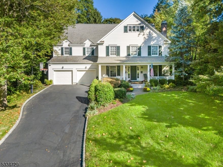 BEAUTIFUL CUSTOM COLONIAL NEAR FRANKLIN ELEMENTARY! This lovingly crafted home delivers warmth, style, & exceptional functionality. Enter the wide Front Porch bathed in sunlight to the open Foyer and cozy Living Room w/ a gas fireplace, a formal Dining Room, & a beautiful Kitchen w/ stainless steel appliances, including a 6-burner gas cooktop, granite countertops, & abundant storage. A light-filled breakfast nook w/ a bay window & built-in banquette provides the perfect place to unwind. The kitchen flows seamlessly into a spacious Family Room w/ media cabinets & access to a serene, fenced backyard featuring a bluestone porch & patio. Completing the 1st Level are a Bonus Ensuite Bedroom, a Mudroom with garage access & a convenient Laundry Room w/ direct backyard access. Travel upstairs via the front or rear staircase to discover a large Family Room with coffered ceiling perfect for relaxing. The Primary Suite features a spacious Bedroom w/ tray ceiling, 2 walk-in closets, & a spa-like Bathroom w/ radiant-heated marble floors, steam shower, jacuzzi tub, & private toilet area. 3 additional bedrooms, each w/ walk-in closets, 2 full Bathrooms and an Office w/ custom cabinetry complete the 2nd Level. The expansive LL, accessible from the front & rear staircases offers great versatility, w/ a Rec Room featuring a wet bar, pool table, & built-in media cabinetry, a playroom w/ ample storage, Bathroom, & impressive workshop space. This exceptional home is ready for its next chapter!