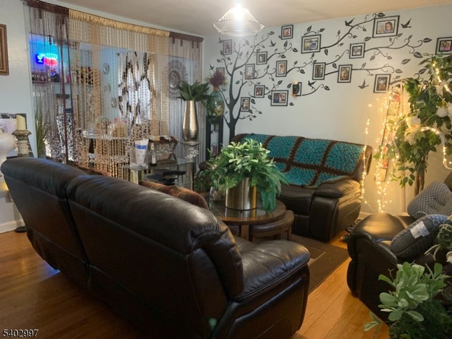 Spacious and sun-filled split-level home featuring five bedrooms and 2.5 bathrooms. The main level offers a welcoming living room, dining room, and kitchen, with abundant natural light and direct access from the kitchen to the backyard ideal for everyday living and entertaining.The upper level includes three well-appointed bedrooms and a full bathroom. The ground level provides two additional bedrooms, one and a half bathrooms, and a versatile bonus room, along with a second kitchen, creating an excellent MOTHER-DAUGHTER setup.The finished basement adds valuable living space with a rec room, utility room, and laundry area. Outdoors, enjoy a fully fenced backyard with patio and storage shed. A generous driveway accommodates multiple cars. Flood zone designation applies; no known history of water intrusion.