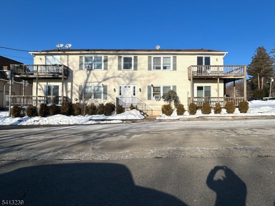 Welcome home to this charming updated rental - 2 nicely sized bedrooms and 1 bathroom. Large windows fill the space with natural light, creating a warm and inviting atmosphere. Lovely kitchen with slider door leading to deck. Convenience of 2 Parking spots.  Awesome location! LAKE ACCESS to the local beach club within less than 1/2 mile. This home offers the best of convenience and recreation. Just minutes to major highways, the train station, restaurants, marinas, hiking and shopping.