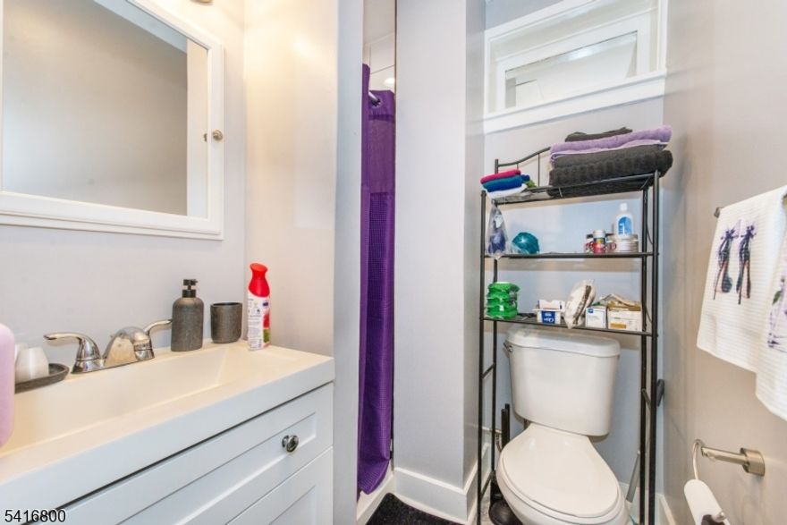 Rare four-family with one attached garage investment opportunity on a quiet dead-end street in a desirable Belleville neighborhood. This well-maintained property offers strong income potential with a versatile unit mix ideal for investors and potential owner-occupants. The building features a common entry hallway providing access to two first-floor apartments, each offering a comfortable one-bedroom layout. The second floor includes a studio apartment and a spacious two-bedroom unit, along with convenient rear egress serving both levels for added accessibility and safety. An unfinished basement provides shared laundry facilities, mechanical systems, electrical panels, and natural gas utilities. Tenants also enjoy shared access to the backyard, offering additional outdoor space. Most tenants are currently on month-to-month leases, with one unit under lease, providing flexibility for future management or occupancy plans. The property will convey with tenants in place unless otherwise agreed upon. Conveniently located just a short walk to the Silver Lake Light Rail Station and close to local shopping and dining options. Nearby amenities include Clara Maass Medical Center and the beautiful Branch Brook Park, offering recreation, open space, and the famous cherry blossoms each spring. This property presents a rare opportunity to acquire a multi-family property in Belleville's strong rental market.