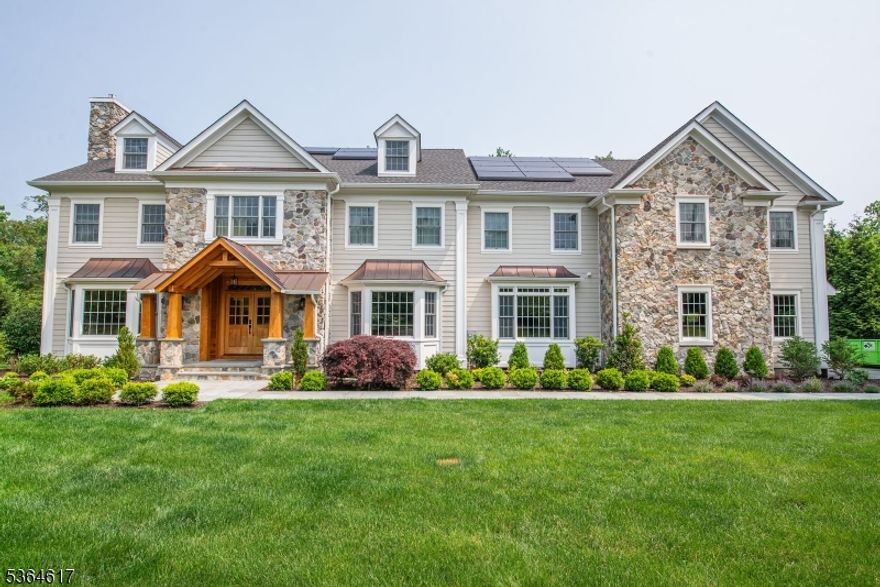 Elegant 5 bedroom, 6 1/2 bath home with impeccable craftsmanship located on a picturesque cul-de-sac street. 1.5 acres of meticulously landscaped level grounds. The gourmet kitchen boasts a large center island, two dishwashers, Thermador 6 burner gas range, Thermador convection oven, warming tray, microwave, ice maker, wet bar and walk-in pantry. The breakfast area offers french doors to a spacious deck.  First floor amenities include a stairway to the second level from the mudroom, full bath and 1/2 bath, office/playroom.  The upstairs primary bedroom suite includes a large sitting/multipurpose room, luxurious bath with a jetted tub, separate shower area and two large walk- in closets. Four en-suite bedrooms, walk up access to attic and a laundry room with custom cabinetry, granite counter complete the second level. Three car garage, walk-out lower level, beautiful outdoor cedar canopy with bracket for T.V. Sunrun solar system which operates the whole house generator, lawn sprinklers, whole house surround sound with outdoor speakers and Tesla charging station adaptability are other amenities to this home. Per Bernards Township 5,715 square feet in living area, 2,447 square feet in lower level.