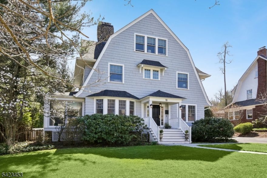 Turnkey, design-forward living with a refined modern aesthetic, ideally positioned between 157-acre Mills Reservation and Iris Mountainside Park/Iris Gardens, just a few blocks from Upper Montclair Village shopping, restaurants, fitness studios & NYC direct train/bus service. completely rebuilt and thoughtfully reimagined with updated systems and curated finishes throughout, this home blends sophisticated design with effortless everyday living. Elegant yet highly livable, the versatile main level features living & dining rooms each anchored by its own fireplace with access to a screened porch for seamless indoor-outdoor flow. The stunning chef's kitchen with center island opens to a sun-filled family room with gas fireplace and direct access to the backyard retreat, while an adjoining breakfast room/game room offers flexible space for casual dining, play or entertaining. The vaulted primary suite offers a spa-like bath with soaking tub, oversized shower, double sinks, water closet, two walk-in closets & adjacent office. Four additional bedrooms include two en-suite baths plus a hall bath with double vanity. The finished lower level features a dedicated audiophile-quality sound studio, ideal for musicians, podcasters or voice/music enthusiasts, and a gym or play space. Outdoor living rivals a private resort with a fully fenced backyard showcasing mature landscaping, expansive terraced bluestone patio with firepit, heated in-ground pool & hot tub. Not to be missed!