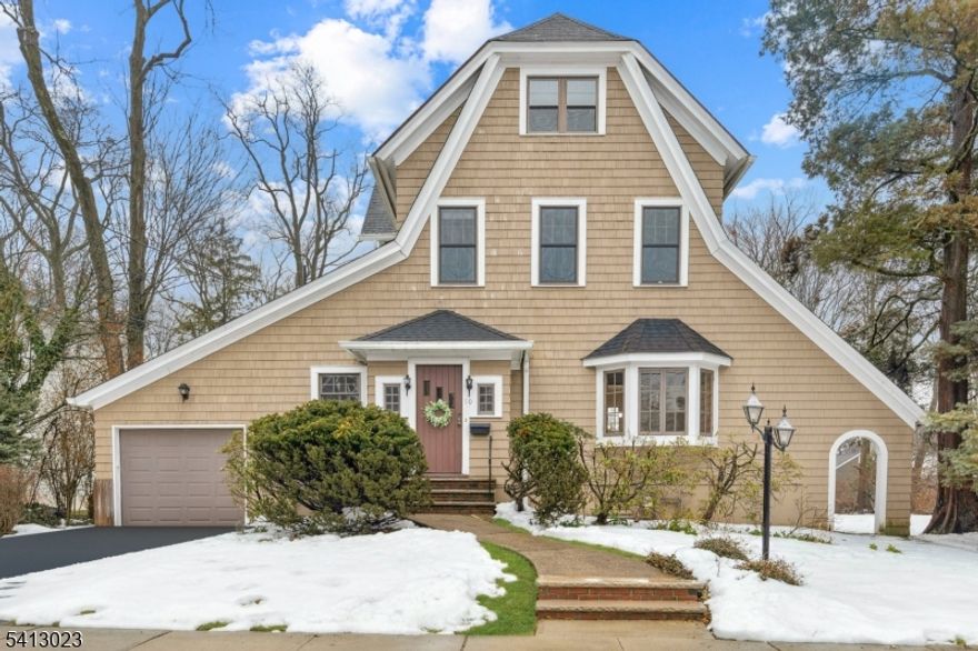IDEALLY LOCATED in a beautiful, no-flood zone CRANFORD neighborhood, this 5-bedroom, 4 1/2-bath Colonial is situated on over a half-acre lot. Enter the tiled vestibule, then step into the foyer, where you will see the new gleaming hardwood floors surrounded by windows streaming natural light, enhancing the large open concept living room/dining room warmed with a gas fireplace that is just off the chef's kitchen with a wet bar. Step back to the family room that opens to a deck, viewing the large level backyard. The butler's pantry/laundry & powder room complete the first floor. There are 3 en suite bedrooms, 2 additional bedrooms, a hall bathroom with a shower over a tub, a partially finished lower level, a home office/gym, a workshop/potential wine cellar, and a mudroom entry from the integral garage or backyard. Plenty of closets and storage space, and a classic staircase leading to the second and third levels. Virtually staged photos suggest possibilities. This spacious home, with its good flow, is equipped for today's luxury lifestyle and entertaining. The seller is open to a quick closing. This home has it all, so visit soon, as it won't last long for buyers who want to make Cranford their forever home.