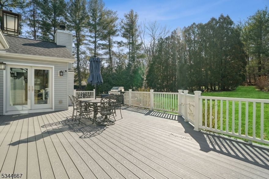 Welcome to this stunning 2017 rebuilt 5-bedroom, 4.5-bath center hall colonial nestled in a peaceful cul-de-sac on 1 acres of land. This gem has been meticulously & lovingly updated & cared for. 1st level offers a welcoming double height EF, formal DR, formal LR, office/den, and a stunning eat-in kitchen overlooks a breathtaking backyard. The two story great room is ideal for relaxing & entertaining, boasting custom woodwork and fireplace. The in-law/guest suite with its own entrance offers a good size bedroom, FB and a sitting area. Access the 2nd floor where you'll find an oversized primary suite with two large walk-in closets, a junior suite, and two additional generously sized bedrooms along with a FB and laundry. The expansive finished basement offers additional living space, ample storage and a 3-car garage with an electric charger. 4 zone AC, new septic, whole house generator, 2 tankless water heaters and much more! This home truly reflects the pride of ownership at every turn!