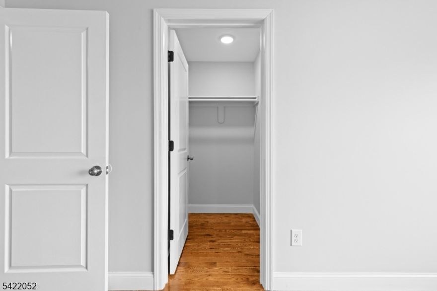 Step into refined comfort in this expansive 3-bedroom, 2-bath residence in the heart of Newark. Designed for both everyday living and effortless entertaining, this home features central air, rich hardwood floors, and a sleek modern kitchen complete with stainless steel appliances and a center island that anchors the space.The primary suite offers a true retreat with two walk-in closets and a private full bath, while the additional bedrooms provide flexibility for guests, work, or relaxation. Enjoy the convenience of in-unit laundry hookups and an abundance of natural light that fills the home throughout the day.Ideally situated near public transportation, schools, and parks, this home delivers the perfect balance of space, style, and accessibility. A place where comfort meets convenience and where you'll truly feel at home.