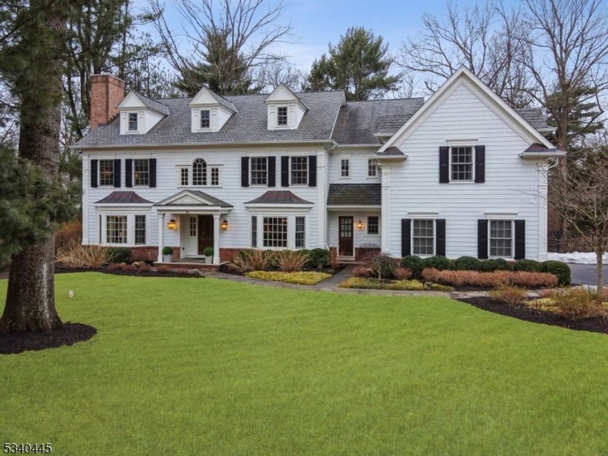 Discover LUXURY and ELEGANCE in this stunning 7 Bedroom, 7.2 Bath CUSTOM Caplan Colonial nestled on a PRIVATE ROAD cul-de-sac on arguably the nicest street in all of Chatham! A GRAND foyer welcomes you into a REGAL living room with stately wood burning fireplace and a formal dining room. The rich moldings and coffered ceilings in the study connect to the large sunlit family room crackling with another fireplace. The GOURMET kitchen features a commercial Wolf oven/gas range, Sub Zero, leathered granite and custom inset cabinetry. Multiple butler's pantries with wine fridge and ice maker enhance your entertaining! The primary suite is a private OASIS with a large sitting room, tray ceiling, walk-in closets and a spa-like primary bath with jetted tub, dual vanities and shower. The second floor also features 4 generous sized bedrooms, each with en-suites. A 3rd level offers a RELAXING retreat with an additional bedroom and bath with 2 large storage areas. The finished basement has a rec room and state of the art gym/bedroom with full bath. Private fenced in and manicured flat half acre backyard,with flowering trees, complete with bluestone patio, custom built shed, oversized 2-car heated garage and 38kW full house Kohler generator. Award winning school district with easy access to NYC trains, airport, town and schools make this home your perfect RETREAT! EXTRAORDINARY property that can compete with any new construction with the finishes and features it offers!