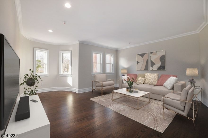 In-town location!  Newer luxury condo with 1238 SF, chic and stylish with stunning millwork, architectural details, quality craftsmanship and beautiful hardwood floors throughout. Windows galore and filled with natural light, this condo is located on the second floor. The living room has a unique curved nook, crown molding and recessed lighting, the kitchen is the highlight with white quartz counters, plenty of cabinets, counter seating with pendant lights, stainless appliances; and a separate eating area, the ensuite bedroom with tray ceiling offers 2 double closets and access to the open porch, the second bedroom has substantial crown molding, double closet, 15 panel glass door to access the open porch in back. The laundry/utility room is on this level as well. The large basement is partially finished, and offers great potential for additional recreational space or abundant storage. Easy commute to NYC, just minutes to the train station (for the mid-town direct) and the quaint downtown with all the restaurants and shops and everything the Rose City has to offer.  Easy to show.