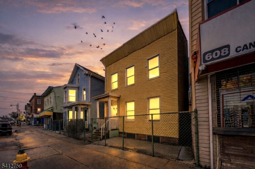 GREAT INVESTMENT OPPORTUNITY! Exceptional 2 Family investment with bonus unit for savvy investors seeking strong rental income potential and long-term value appreciation after renovations. This well positioned property features 3 Bedrooms and 1 Bathroom on first and second floor and 4 Bedrooms and 1 Bathroom on the attic. The property also includes an unfinished basement offering additional possibilities for storage or future customization, as well as a generously sized backyard. Ideally located near schools, hospitals, parks and major transportation routes to NYC. This home provides convenient access to Highway 80, GSPW, Route 21. Sold AS-IS. PROPERTY WILL BE DELIVERED FULLY VACANT AND EMPTY AT CLOSING. With it's prime location, this property presents outstanding income potential and excellent opportunities for future growth!