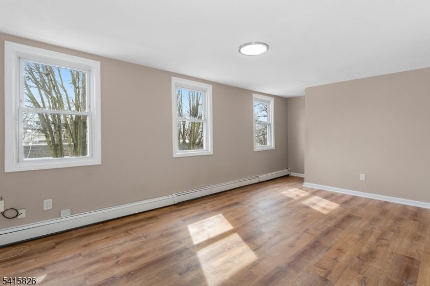 Freshly Renovated 2nd Floor Apartment features 4 bedrooms a spacious eat in kitchen, new bathroom and bright open living space area. Located a block away from Haledon Ave for public transportation stops.