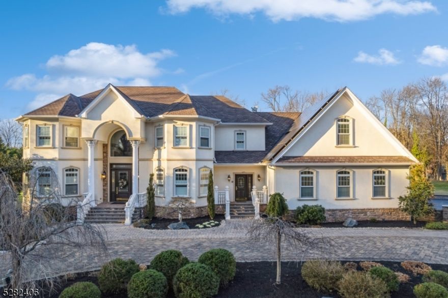 Magnificent custom built 5500' home on almost an acre of manicured property in the Arrowhead Park section of north Edison.Schoenberg crystal chandelier graces the foyer enhanced by a stunning solid oak sweetheart staircase. Custom millwork throughout in every room. 9'  first floor ceiling includes heated marble, wood & porcelain flooring. Formal dining & living room. Family room with custom built stone & marble wood burning fireplace with tray ceiling, inset lighting & lighted paddle fan. Gourmet chef kitchen with butler's pantry, wine bar, 8 burner gas range, pot filler, infra red warming bed, double wall ovens, GE Monogram 42  refrigerator, 8' center island incl double draw refrigerators, microwave, additional sink & under island storage. Newly installed paver patio. 1st floor includes office, bedroom w/en-suite, separate service entrance, powder room, 2nd stairway w/chair lift. Second level includes the primary suite with tray ceiling, gas fireplace, prayer/reading room, walk-in closet, balcony, en-suite w/jetted soaking tub, steam shower, 2 separate water closets, custom cabinetry. 4 bedrooms, one with en-suite, other 2 w/Jack/Jill bathroom. Bonus room above garage. 4 HVAC units w/multi zones. Heated garage & basement floor. Whole house generator. Private well for lawn irrigation. Sunnova Solar system transferable. Alarm system. North Edison public schools, Wardlaw Hartridge, St. Joseph HS private schools; near Met Golf&CC; Metro Park .OFFER ACCEPTED No further showings.