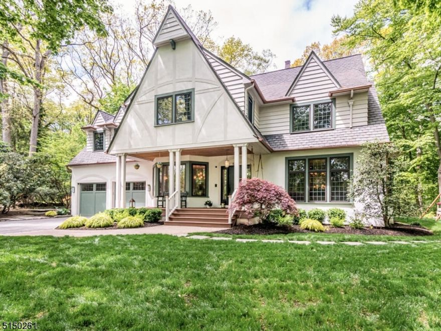 Perfection from top to bottom and nestled in the private park "The Hoo" of Montclair with easy access to NYC trains and busses. Expansive and graceful rooms with four fireplaces, six bedrooms and six full bathrooms. The first floor guest room will charm you, the huge master suite will "wow" you (with vaulted ceilings and heated bathroom floor), and the bedrooms will melt your heart. Viking appliances glisten in this gorgeous kitchen with butler's pantry, wine fridge, Miele coffee maker, and two dishwashers.  Feel secure with a whole house generator, french drains, whole house water softener, and attached two car garage that opens right into the kitchen. Lots of room for play in the Great Room, the third floor playroom/gym (with cedar closet), and the fully finished basement. A new in-ground plunge pool with deck jets create a dazzling water show on the backyard patio which gracefully merges with The Hoo's 2+ acre wooded preserve.  This is where harmony and luxury meet - right in the heart of Upper Montclair.