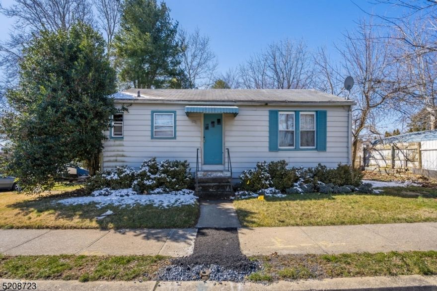 This cozy ranch home already has much to offer and with some TLC could be true great investment property, with beautiful, updated flooring throughout, spacious rooms and municipal sewer hookup located on street. The spacious covered deck looks out to a private large, level lot for year around entertainment. This commuter dream location offers access to Rt. 22/78, shopping and fine dining. Home is being sold strictly "As Is