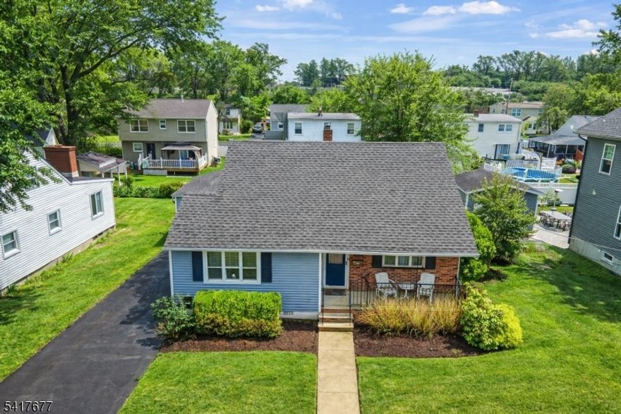 Welcome to this beautifully expanded Cape Cod home in the highly sought-after Maple Hill section of Clifton! Offering 3 bedrooms and 2 full baths, this home blends classic charm with modern comfort.The first floor features two spacious bedrooms, a sun-filled living room, and a large eat-in kitchen with a dedicated dining area perfect for both everyday living and entertaining. The second level is a private primary retreat complete with a full bath, providing comfort and privacy.A fully finished basement adds valuable bonus space, ideal for a recreation room, home office, or gym.Step outside to a generously sized, manicured backyard, fully fenced for privacy perfect for outdoor gatherings, relaxation, or play. A detached garage completes the package. Located close to parks, schools, shopping, and NYC transportation, this home offers the perfect combination of convenience and lifestyle.A true standout in a prime location don't miss this exceptional opportunity!