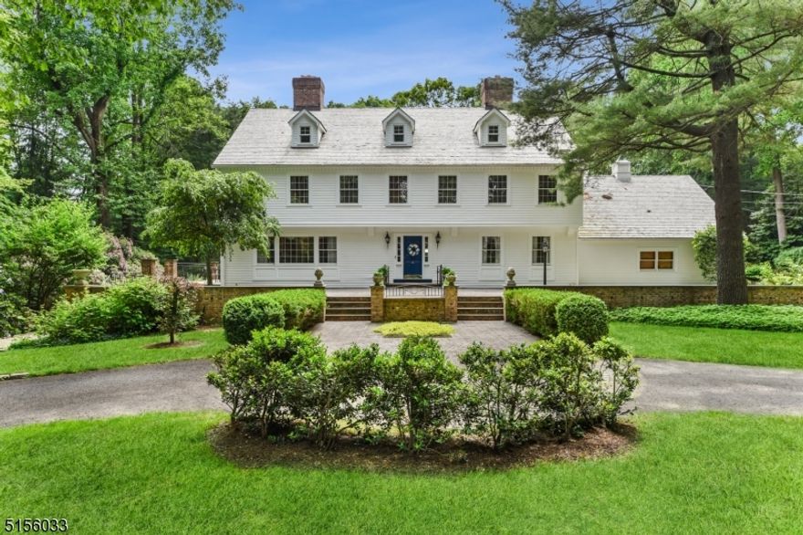 Welcome to this lovingly-maintained classic colonial set on 2.2 acres located within a cul-de-sac. Enter into the grand foyer & enjoy high ceilings, hardwood flooring, security system, central vacuum & many other charming features. This home has the perfect entertaining flow with over-sized rooms & 3 fireplaces. There are French doors leading to stone patios from most rooms. The upstairs consists of 5 bedrooms + a den & 5 full baths. This home has a 3 car attached garage along with a 3car detached garage that has a back entrance from Chestnut Ridge Rd. There is a large finished basement with 9 foot ceilings inclusive of a game room, office, wine cellar, powder room & unfinished storage area. The private yard has a lovely heated  in-ground pool. This is a very special home in the coveted Chestnut Ridge section of Saddle River. Low taxes & serenity awaits you!