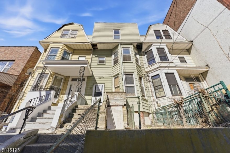 Welcome to 97 Clifton Pl in Jersey City, a 3-unit triplex investment opportunity located in a strong rental market with convenient access to NYC, major highways, and public transportation. The triplex is situated on a deep 16.7 x 120 lot in Jersey City. Partially started project ready for an investor to step in and complete with Strong value-add potential. This versatile property is an excellent opportunity for multifamily investors looking to expand their multifamily portfolio or those looking to live in one unit while collecting rent from the others. Strictly As-Is. Buyer responsible for all required certificates and inspections. Conveniently located near local shops, restaurants, parks, and transportation options, this property offers strong upside potential in a growing Jersey City market.
