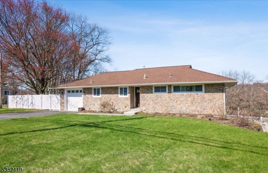 Welcome to this beautifully updated 4-bedroom, 2-bathroom, 1 car attached garage Ranch in one of Randolph's most desirable neighborhoods. This thoughtfully renovated home offers a spacious layout and modern updates perfect for today's lifestyle. Step inside to an open-concept main living area that connects the living and dining space with a stylish, renovated kitchen. Featuring granite countertops, stainless steel appliances, a breakfast bar, and ample cabinetry, this kitchen is both functional and elegant perfect for everyday living and entertaining. 3 bedrooms on the main level include a generous primary bedroom, along with 2 additional bedrooms and a full bath. Large windows throughout the main floor flood the space with natural light and provide a warm, inviting feel.The fully finished walk-out basement is a major highlight, offering a spacious family room that opens to a paver patio and fully fenced backyard ideal for gatherings or relaxing outdoors. The lower level also features a private 4th bedroom with a walk-in closet, a 2nd full bathroom, and a large laundry/utility area for added convenience. Extensive updates throughout - please refer to the "Highlights Sheet" in the media section for full details. The home is equipped with a whole-house generator for added peace of mind. Located in highly sought-after Randolph, known for its Top-Rated Schools, beautiful parks, and close proximity to shopping, dining, and major highways. Move in ready-This home truly has it all!